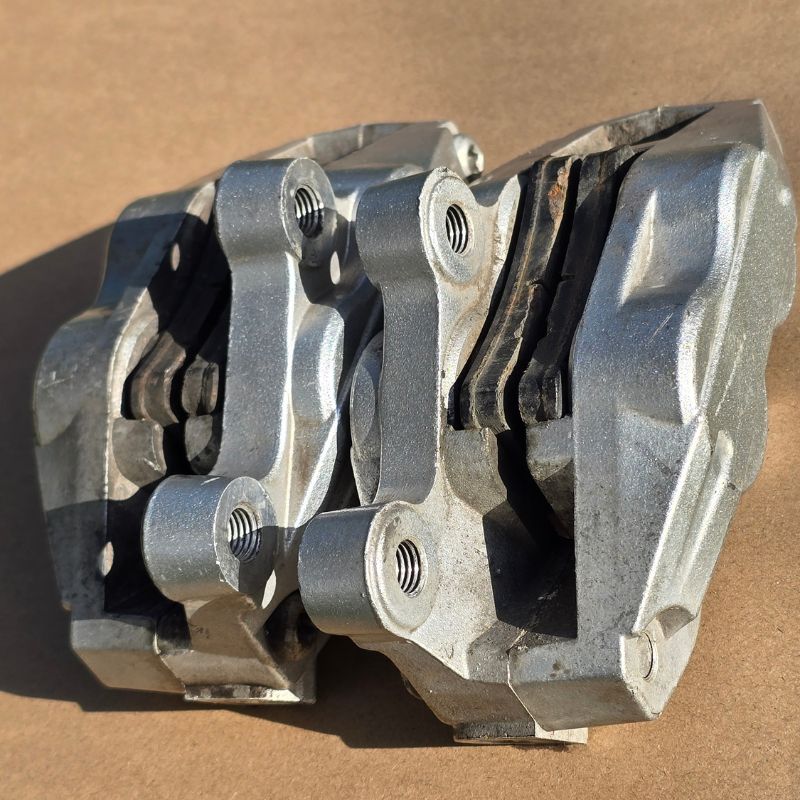 Benelli 302 front brake caliper