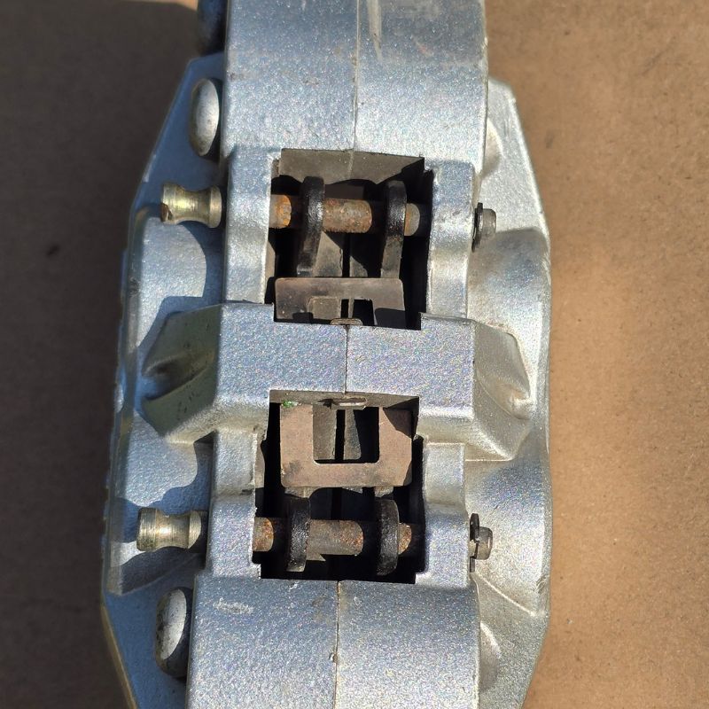 Benelli 302 front brake caliper