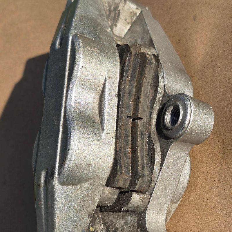 Benelli 302 front brake caliper